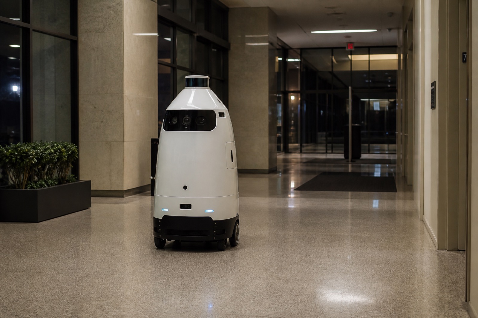 Security robot on patrol in a commercial facility.